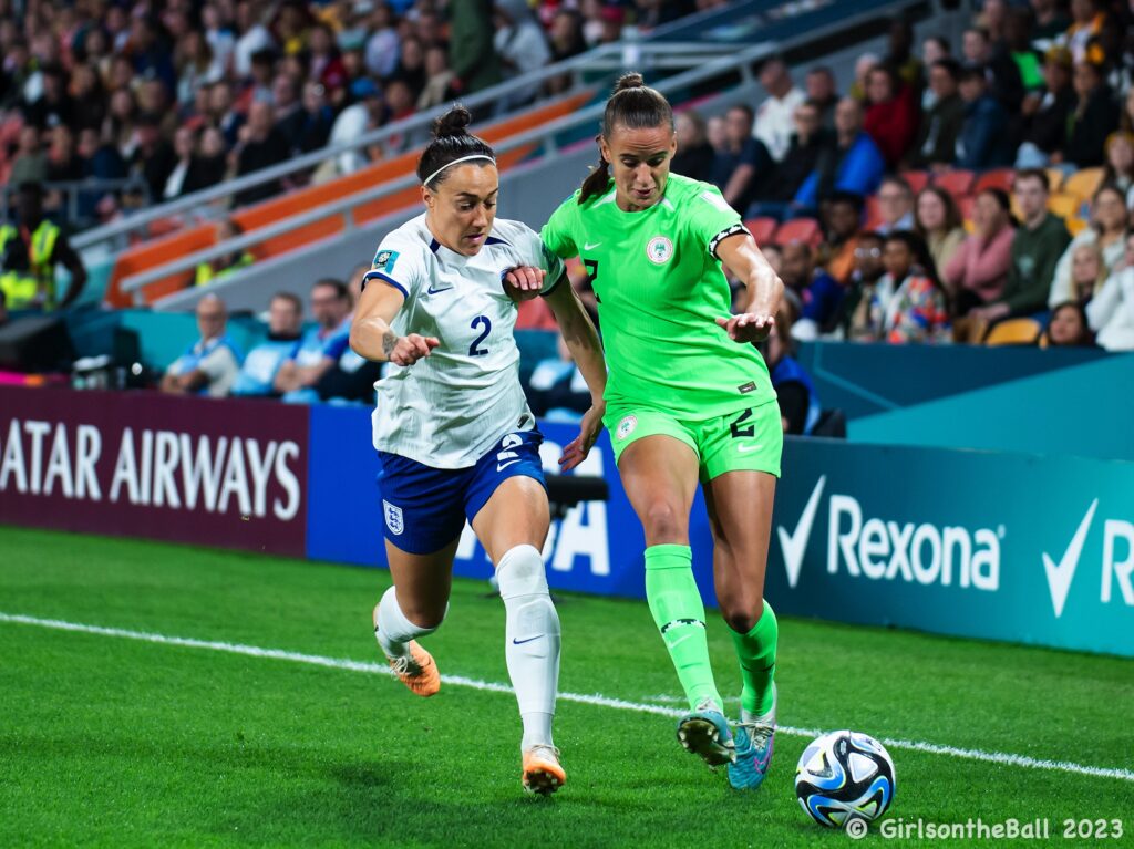 Ashleigh Plumptre takes on Lucy Bronze, England v Nigeria, FIFAWWC