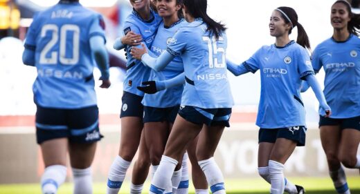 Manchester City celebrate Mary Fowler's goal against Aston Villa