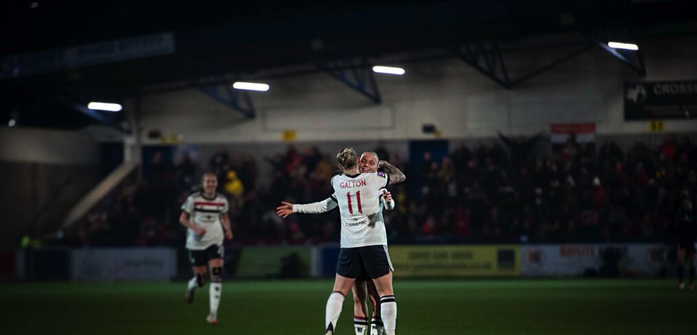 Leah Galton celebrates with Anna Sandberg in Manchester United's Adobe Women's FA Cup win over Wolves