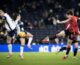 Dominqiue Janssen strikes the ball as Manchester United take on Tottenham in the Barclays WSL