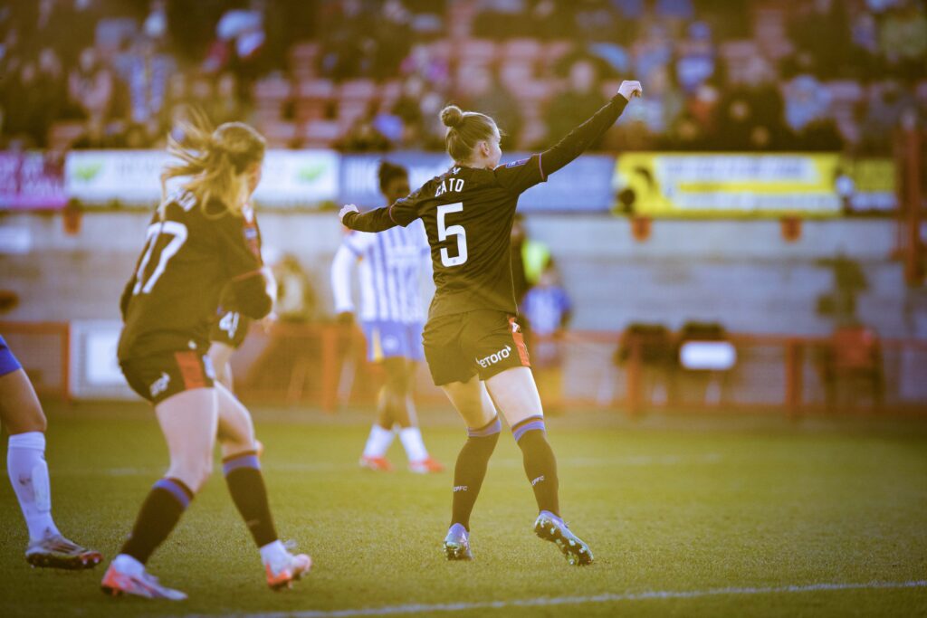 My Cato celebrates scoring Crystal Palace's equaliser against Brighton in the Barclays WSL